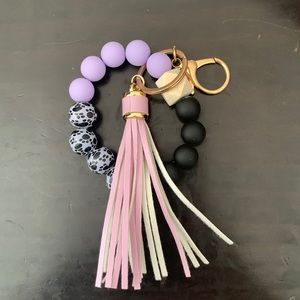 4/$20 NIB Purple Silicone Keychain